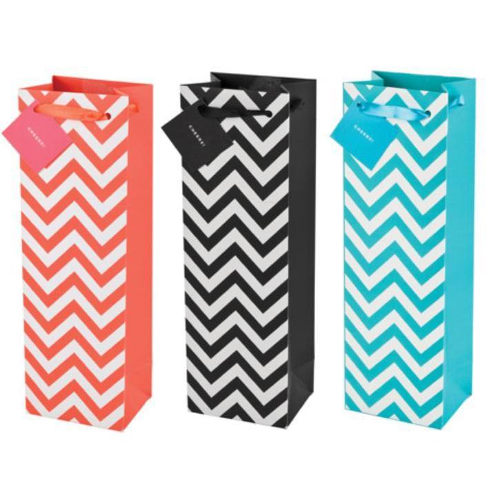 Paper wine gift bag with chevron zigzag pattern and ribbon handles